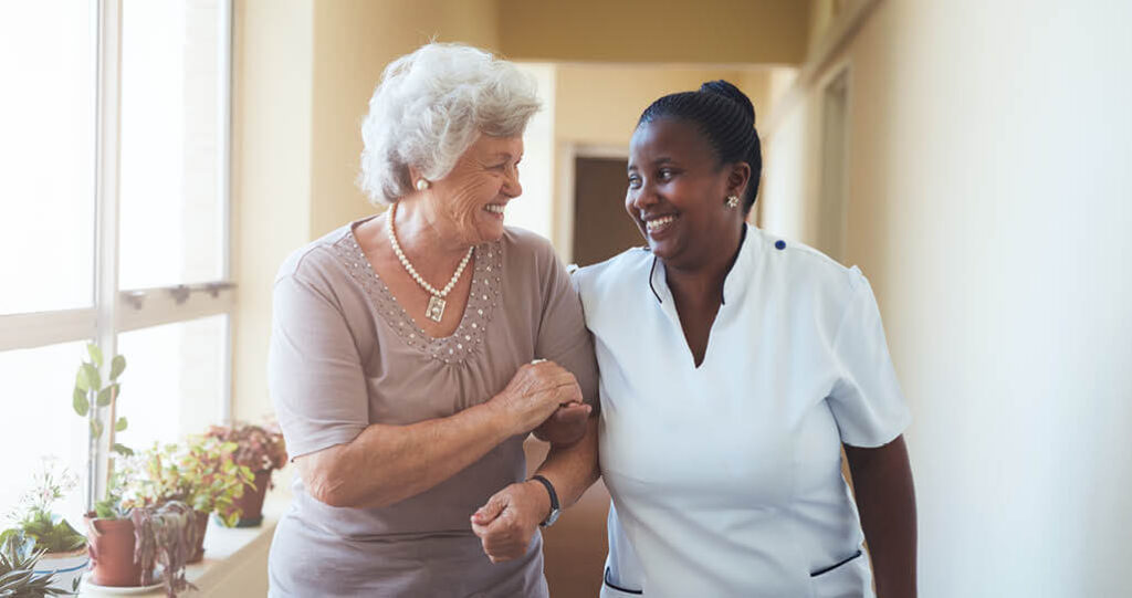 staff-and-elderly-smiling-together